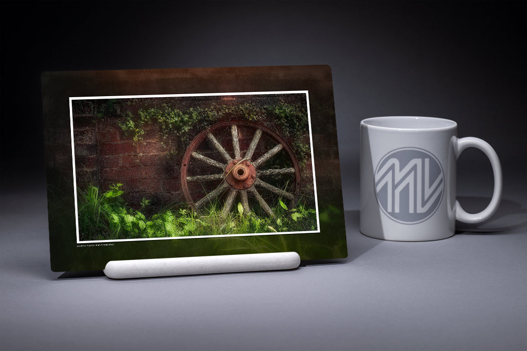 &quot;Wagon Wheel Against a Wall&quot; 6x9 Metal Print &amp; Stand